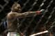 Anthony Johnson celebrates after beating Antonio Rogerio Nogueira by technical knockout during the first round of a light heavyweight mixed martial arts bout at a UFC on Fox event in San Jose, Calif., Saturday, July 26, 2014. (AP Photo/Jeff Chiu)