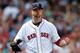 BOSTON, MA - JULY 20: Jon Lester #31 of the Boston Red Sox reacts after getting out of trouble in the sixth inning against the Kansas City Royals at Fenway Park on July 20, 2014 in Boston, Massachusetts. (Photo by Jim Rogash/Getty Images)