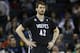 Minnesota Timberwolves forward Kevin Love stands on the court as his team plays against the Charlotte Bobcats during the first half of an NBA basketball game in Charlotte, N.C., Friday, March 14, 2014. (AP Photo/Nell Redmond)