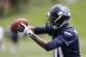 Seattle Seahawks rookie wide receiver Paul Richardson makes a catch, Friday, May 16, 2014, during an NFL football rookie minicamp in Renton, Wash. (AP Photo/Ted S. Warren)