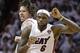 Miami Heat shooting guard Mike Miller (13) and LeBron James celebrate during the second half of Game 2 of the NBA Finals basketball game against the San Antonio Spurs, Sunday, June 9, 2013 in Miami. (AP Photo/Lynne Sladky)