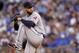 Cleveland Indians pitcher Corey Kluber throws in the fifth inning of a baseball game against the Kansas City Royals at Kauffman Stadium in Kansas City, Mo., Thursday, July 24, 2014. (AP Photo/Colin E. Braley)