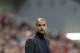 Bayern head coach Pep Guardiola of Spain watches his team during the Champions League semifinal second leg soccer match between Bayern Munich and Real Madrid at the Allianz Arena in Munich, southern Germany, Tuesday, April 29, 2014. (AP Photo/Matthias Schrader)