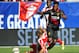 CHICAGO, IL - JULY 27: Dimitris Siovas #23 of Olympiacos FC defends Daniel Sturridge #15 of Liverpool during the International Champions Cup 2014 on July 27, 2014 at Soldier Field in Chicago, Illinois. (Photo by David Banks/Getty Images)