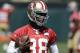 San Francisco 49ers running back Marcus Lattimore (38) carries a ball during NFL football mini-camp in Santa Clara, Calif., Tuesday, June 17, 2014. (AP Photo/Jeff Chiu)