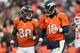 DENVER, CO - DECEMBER 30: Quarterback Peyton Manning #18 and wide receiver Demaryius Thomas #88 of the Denver Broncos run off the field after a score during a game against the Kansas City Chiefs at Sports Authority Field at Mile High on December 30, 2012 in Denver, Colorado. The Broncos defeated the Chiefs 38-3. (Photo by Dustin Bradford/Getty Images)