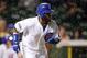 May 20, 2014; Chicago, IL, USA; Chicago Cubs outfielder Emilio Bonifacio (64) hits a RBI single against the New York Yankees during the third inning at Wrigley Field. Mandatory Credit: Jerry Lai-USA TODAY Sports