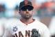 Jul 27, 2014; San Francisco, CA, USA; San Francisco Giants second baseman Dan Uggla (22) returns to the dugout after the fourth inning of the game against the Los Angeles Dodgers at AT&T Park. Mandatory Credit: Ed Szczepanski-USA TODAY Sports