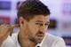 England national soccer team captain Steven Gerrard answers a question from a member of the media during a press conference after a squad training session that was closed to the media for the 2014 soccer World Cup at the Urca military base in Rio de Janeiro, Brazil, Sunday, June 22, 2014. Costa Rica's surprise 1-0 win over Italy on Friday meant that England made its most humiliating exit from a World Cup since 1958, following consecutive defeats by the Italians and then Uruguay in Group D. England play Costa Rica in their final Group D match on Tuesday. (AP Photo/Matt Dunham)