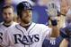 Tampa Bay Rays' Ben Zobrist high fives teammates in the dugout after his home run off Milwaukee Brewers starting pitcher Matt Garza during the sixth inning of an interleague baseball game Tuesday, July 29, 2014, in St. Petersburg, Fla. (AP Photo/Chris O'Meara)