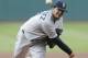 Seattle Mariners starting pitcher Felix Hernandez delivers in the first inning of a baseball game against the Cleveland Indians Wednesday, July 30, 2014, in Cleveland. (AP Photo/Tony Dejak)