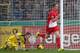 Freiburg's Matthias Ginter celebrates his side's opening goal during a round of 16 German soccer cup match between SC Freiburg and Bayer Leverkusen in Freiburg, Germany, Wednesday, Dec. 4, 2013. (AP Photo/Michael Probst)
