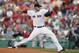 Boston Red Sox's John Lackey pitches in the first inning of the second game of a baseball doubleheader against the Baltimore Orioles in Boston, Saturday, July 5, 2014. (AP Photo/Michael Dwyer)