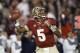 Florida State quarterback Jameis Winston (5) throws a pass against Auburn University in the 2014 BCS Championship NCAA College Football game on Monday, Jan. 6, 2014 in Pasadena, Calif. (AP Photo/Doug Benc)