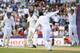 SOUTHAMPTON, ENGLAND - JULY 31: England bowler Moeen Ali and captain Alastair Cook (r) celebrate after Ali had taken the wicket of India batsman Pankaj Singh to win the match during day five of the 3rd Investec Test match between England and India at Ageas Bowl on July 31, 2014 in Southampton, England. (Photo by Stu Forster/Getty Images)