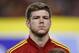 Spain's player Alberto Moreno listens to the national anthem prior a 2014 World Cup Group I qualifying soccer match between Spain and Georgia at the Carlos Belmonte stadium in Albacete, Spain, Tuesday Oct. 15, 2013. (AP Photo/Fernando Bustamante)