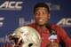 Florida State's Jameis Winston answers a question during a news conference at the Atlantic Coast Conference Football kickoff in Greensboro, N.C., Sunday, July 20, 2014. (AP Photo/Chuck Burton)