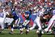 EAST RUTHERFORD, NJ - OCTOBER 16: Eli Manning #10 of the New York Giants looks to pass against the Buffalo Bills at MetLife Stadium on October 16, 2011 in East Rutherford, New Jersey. (Photo by Nick Laham/Getty Images)