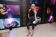 Singer Ashley Roberts poses in front of the WTA's Strong is Beautiful images at the 2014 pre-Wimbledon party.