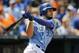 Kansas City Royals' Eric Hosmer follows through on an RBI double in the seventh inning of a baseball game against the Detroit Tigers at Kauffman Stadium in Kansas City, Mo., Sunday, July 13, 2014. (AP Photo/Colin E. Braley)