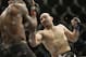 Glover Teixeira, right, fights Quinton Jackson during UFC Light Heavyweight Championship on FOX 6 at the United Center in Chicago, Saturday, Jan. 26, 2013. Teixeira won the bout. (AP Photo/Nam Y. Huh)