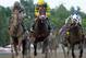 In a photo provided by the New York Racing Association, Palace Malice, center, with jockey Mike Smith, captures the Jim Dandy horse race at Saratoga Race Course on Saturday, July 27, 2013, in Saratoga Springs, N.Y. (AP Photo/New York Racing Association, Adam Coglianese)