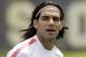 AS Monaco FC forward Radamel Falcao looks to the stands as he warms up for preseason soccer training practice in Miami, Monday, July 21, 2014. AS Monaco FC will face Atletico Nacional, of Colombia, on July 23 in Miami. (AP Photo/Alan Diaz)
