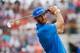 HOYLAKE, ENGLAND - JULY 20: Dustin Johnson of the United States tees off on the 4th hole during the final round of The 143rd Open Championship at Royal Liverpool on July 20, 2014 in Hoylake, England. (Photo by Tom Pennington/Getty Images)