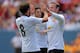 DENVER, CO - JULY 26: Wayne Rooney #10 of Manchester United celebrates his second goal with Juan Mata #8 during the first half of an International Champions Cup match against AS Roma at Sports Authority Field at Mile High on July 26, 2014 in Denver, Colorado. (Photo by Justin Edmonds/Getty Images)