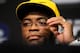 Anderson Silva looks on during the post fight news conference after his loss to Chris Weidman at a UFC 162 mixed martial arts middleweight championship bout Saturday, July 6, 2013, in Las Vegas. Weidman won with a second round TKO. (AP Photo/David Becker)