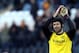 Chelsea's goalkeeper Petr Cech celebrates at the end of their English Premier League soccer match against Hull City at the KC Stadium, Hull, England, Saturday, Jan. 11, 2014. (AP Photo/Scott Heppell)