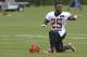 Cincinnati Bengals running back Giovani Bernard loosens up during the NFL football team's first practice at training camp, Thursday, July 24, 2014, in Cincinnati. (AP Photo)
