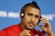 Arturo Vidal of Chile adjusts his headphones during a press conference at the Itaquerao Stadium in Sao Paulo, Brazil, Sunday, June 22, 2014. Chile will play Netherlands in a match that will decide the winner of Group B at the 2014 soccer World Cup. (AP Photo/Wong Maye-E)