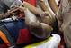 Indiana Pacers' Paul George is taken off the court after he was injured during the USA Basketball Showcase game Friday, Aug. 1, 2014, in Las Vegas. (AP Photo/John Locher)