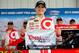 LONG POND, PA - AUGUST 01: Kyle Larson, driver of the #42 Target Chevrolet, poses with the Coors Light Pole Award after qualifying for the NASCAR Sprint Cup Series GoBowling.com 400 at Pocono Raceway on August 1, 2014 in Long Pond, Pennsylvania. (Photo by Jared C. Tilton/Getty Images)