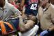 Indiana Pacers' Paul George is taken off the court after he was injured during the USA Basketball Showcase game Friday, Aug. 1, 2014, in Las Vegas. (AP Photo/John Locher)