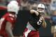 Arizona Cardinals' Drew Stanton (5) throws the ball during the first day of NFL football training camp on Saturday, July 26, 2014, in Glendale, Ariz. (AP Photo/Ross D. Franklin)