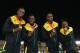 GLASGOW, SCOTLAND - AUGUST 02: Usain Bolt, Nickel Ashmeade Kemar Bailey-Cole and Jason Livermore of Jamaica pose on the podium during the medal ceremony for the Men's 4x100 metres relay at Hampden Park during day ten of the Glasgow 2014 Commonwealth Games on August 2, 2014 in Glasgow, United Kingdom. (Photo by Cameron Spencer/Getty Images)