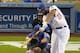 Los Angeles Dodgers' Matt Kemp, right, hits a two-run home run as Chicago Cubs catcher Welington Castillo, left, and home plate umpire Tony Randazzo look on during the fourth inning of a baseball game, Saturday, Aug. 2, 2014, in Los Angeles. (AP Photo/Mark J. Terrill)