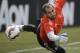 Real Madrid goalkeeper Diego López deflects a shot during training for the their 2014 Guinness International Champions Cup soccer match against Manchester United at Michigan Stadium in Ann Arbor, Mich., Friday, Aug. 1, 2014. (AP Photo/Paul Sancya)
