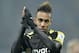 Dortmund's Pierre-Emerick Aubameyang of Gabon celebrates with fans after the German Bundesliga soccer match between Eintracht Braunschweig and Borussia Dortmund in Braunschweig, Germany, Friday, Jan. 31, 2014. Braunschweig was defeated by Dortmund with 1-2, Aubameyang scored twice. (AP Photo/Martin Meissner)