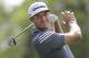 Dustin Johnson watches his tee shot on the 18th hole during the first round of the PGA Colonial golf tournament in Fort Worth, Texas, Thursday, May 22, 2014. (AP Photo/LM Otero)