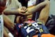 Aug 1, 2014; Las Vegas, NV, USA; Team USA guard Paul George is carted off the floor on a gurney after suffering a lower leg injury during the USA Basketball Showcase at Thomas & Mack Center. Mandatory Credit: Stephen R. Sylvanie-USA TODAY Sports