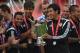 LONDON, ENGLAND - AUGUST 03: Dani Parejo (R) of Valencia with the trophy after the Emirates Cup match between Arsenal and AS Monaco at the Emirates Stadium on August 3, 2014 in London, England. (Photo by Michael Regan/Getty Images)
