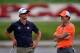 PALM BEACH GARDENS, FL - FEBRUARY 27: Rory McIlroy of Northern Ireland (R) and Adam Scott of Australia talk to one another during the first round of The Honda Classic at PGA National Resort and Spa on February 27, 2014 in Palm Beach Gardens, Florida. (Photo by Stuart Franklin/Getty Images)