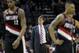 Portland Trail Blazers head coach Terry Stotts, center, stands on the sideline during the second half of Game 1 of a Western Conference semifinal NBA basketball playoff series against the San Antonio Spurs, Tuesday, May 6, 2014, in San Antonio. (AP Photo/Eric Gay)