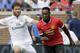 ANN ARBOR, MI - AUGUST 2: Xabi Alonso #14 of Real Madrid tries to maintain control of the ball against Danny Welbeck #19 of Manchester United during the first half of the Guinness International Champions Cup at Michigan Stadium on August 2, 2014, in Ann Arbor, Mich (Photo by Duane Burleson/Getty Images)