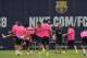 FC Barcelona's Xavi Hernandez, center left, exercises during a training session at the Sports Center FC Barcelona Joan Gamper in San Joan Despi, Spain, Friday, July 25, 2014. (AP Photo/Manu Fernandez)