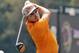 Rickie Fowler watches his tee shot on the third hole during the final round of the Bridgestone Invitational golf tournament Sunday, Aug. 3, 2014, at Firestone Country Club in Akron, Ohio. (AP Photo/Phil Long)