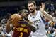 Cleveland Cavaliers' Dion Waiters, left, drives around Minnesota Timberwolves' Kevin Love in the second half of an NBA basketball game Wednesday, Nov. 13, 2013, in Minneapolis. The Timberwolves won 124-95. (AP Photo/Jim Mone)